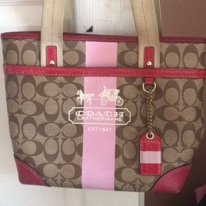 Classic pink and tan coach bag